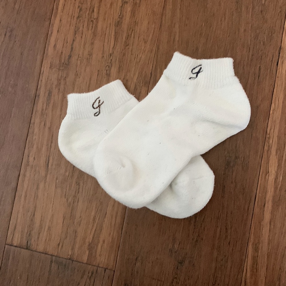 White socks with black emblem